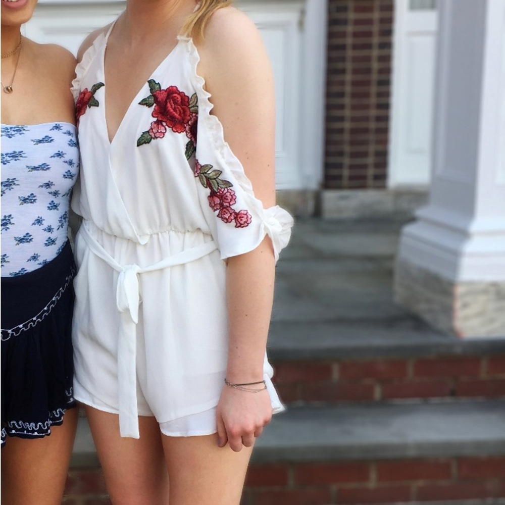 White romper with floral embroidery